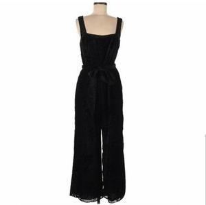 Anthropologie black velvet rose jumpsuit size 00